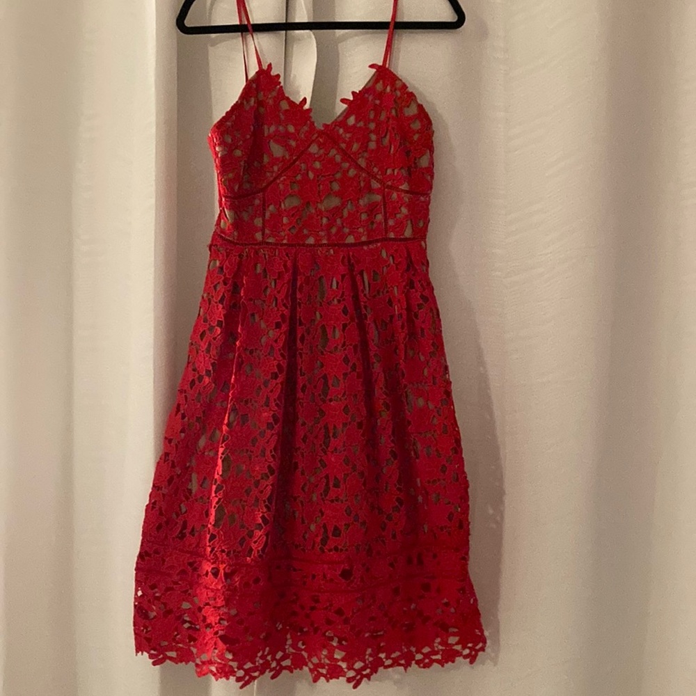Red lace dress, nude underlying